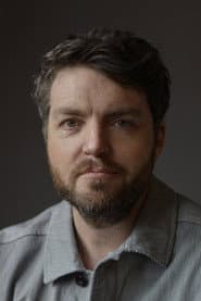 Foto del actor Tom Burke